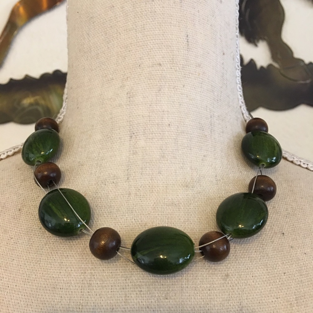 Glass and wood floating bead fish line necklace